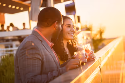 Couple enjoying sunset views at Skysill Rooftop Lounge in Tempe, Arizona